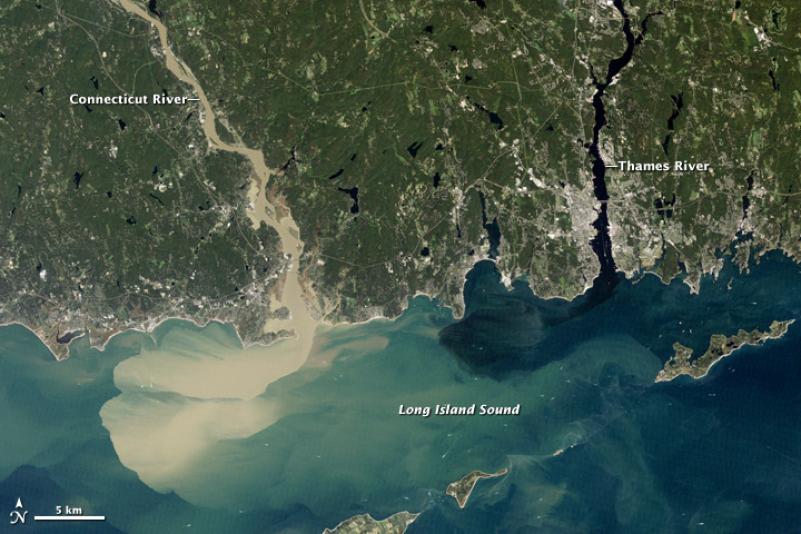 A satellite view of the Connecticut River following the floods of Hurricane Irene in 2011 shows how much sediment this mighty river carries and redistributes. Intact floodplains, including forests, protect life, property, and water quality. NASA EARTH OBSERVATORY 